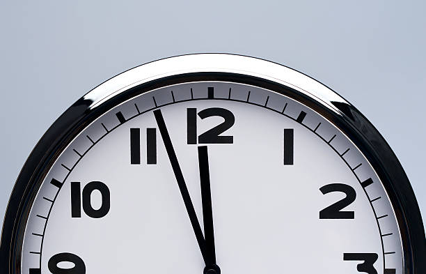 istock shiny clock hanging on the wall with copy space.Deadline concept 158172197