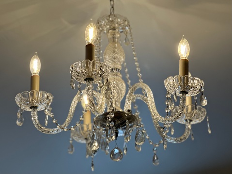 Crystal chandelier with five candles (blue toned)