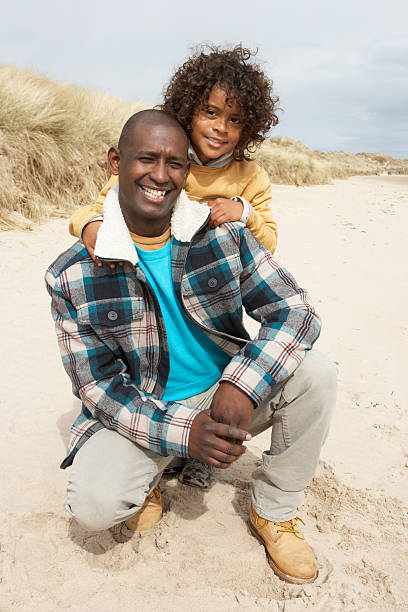 istock Father and Son On Winter Beach 158176201