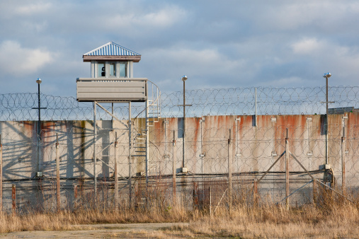 Prison wall and guard lookout tower.