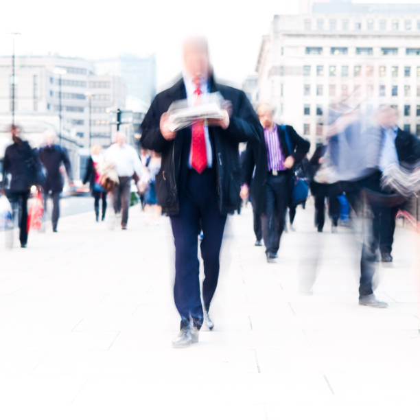 istock Reading the news walking 158179055