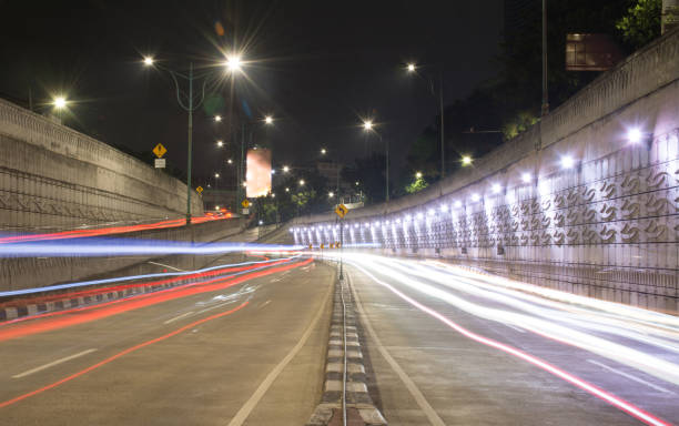 istock Jakarta Night Traffic Light Trails – Slow Shutter Technique 1581795468