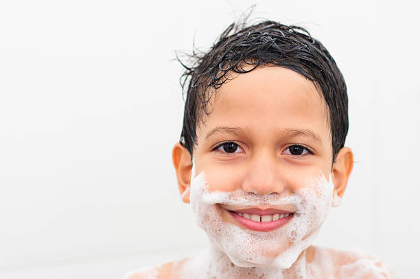 istock Boy in the bath with a foam mustache 158181340