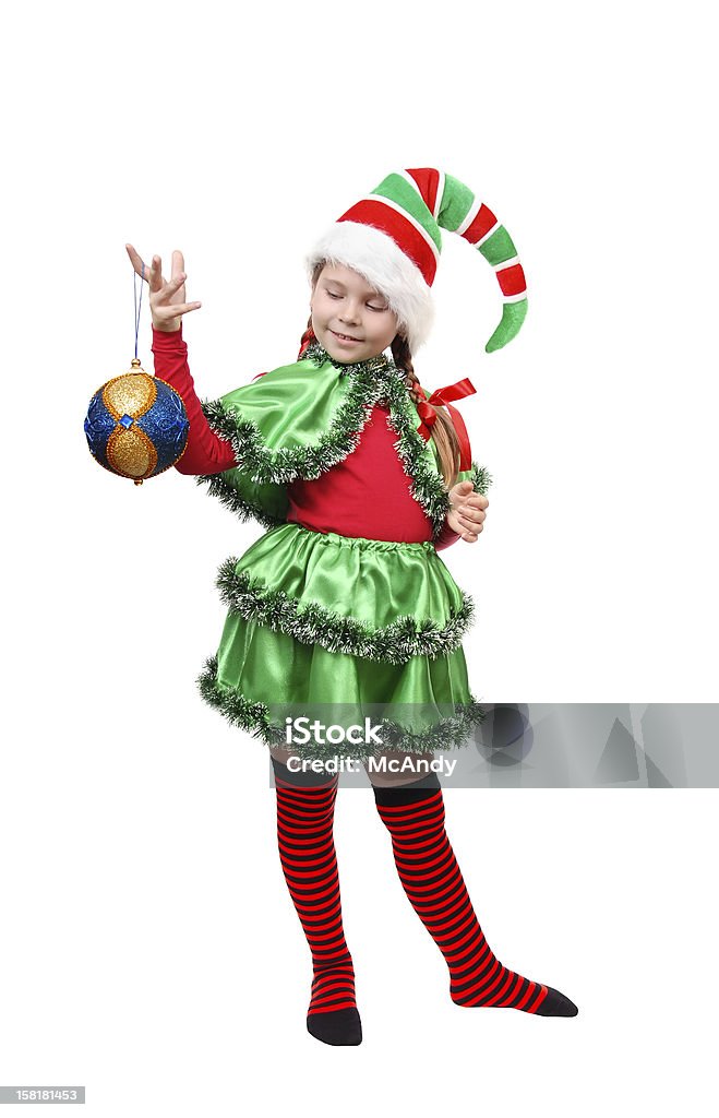 elf di Babbo Natale con una palla di Natale. - Foto stock royalty-free di Allegro