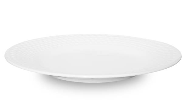 istock White circle ceramics plate isolated on white background. 1581816091