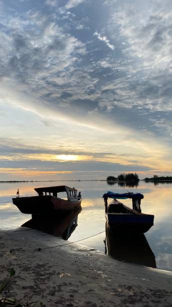 istock sunset from a fishing boat on the beach 1581877107