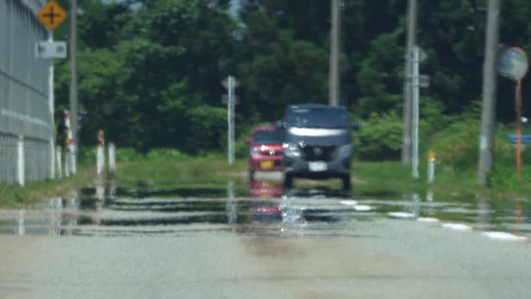 Road mirage or water mirage or inferior mirage on a road in Akita, Japan