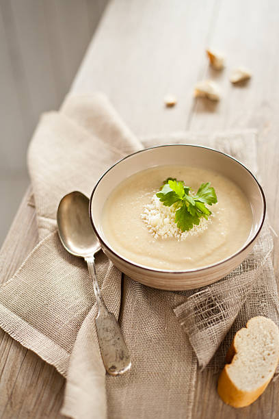 Celery root soup Celery root soup with parsley and croutons. Celeriac stock pictures, royalty-free photos & images