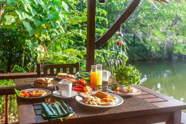 istock Restaurant near a beautiful lake in Asia. 1581920021