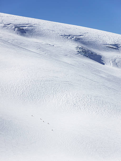 Skiers on glacier in La Grave stock photo