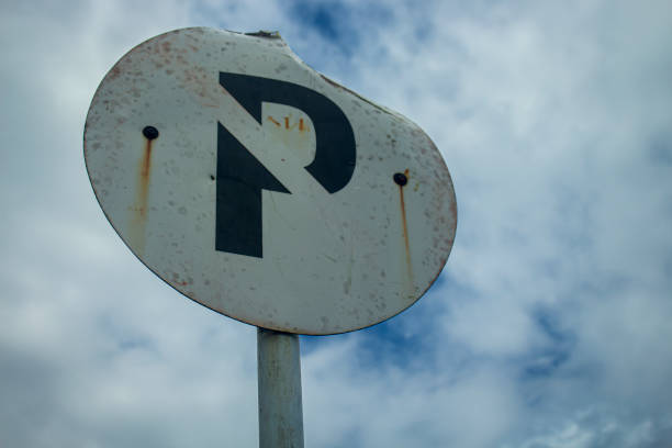 istock the no parking sign is almost broken 1581955777
