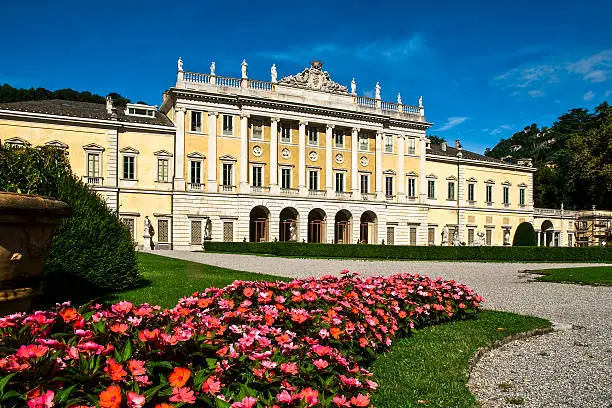 The central part, neoclassical, was designed by Simone Cantoni in the late eighteenth century. After having passed through several owners, the villa now belongs to the town of Como, after restoration, has destined to house cultural events. The beautiful park of the villa is located directly on Lake Como