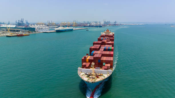 istock container cargo ship import export global business and industry commercial trade logistic and transportation of international by container cargo ship in the open sea, Container cargo freight shipping, front view drone shot, 1581978624