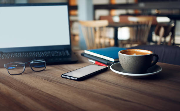 istock working in cafe with laptop and drink coffee 1582008403