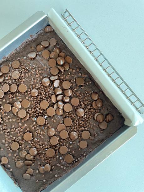 istock Chocolate chip brownies before the frosting 1582015534