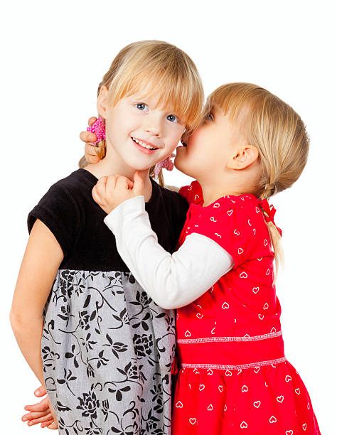 istock Little girls sharing a secret 158202391