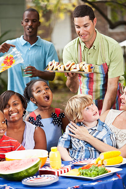 istock Two families at backyard cookout 158210907