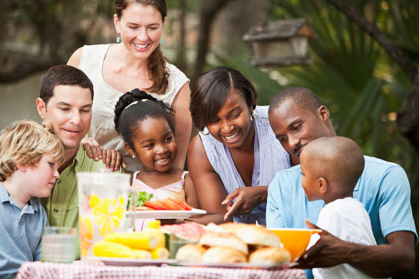 istock Two families at backyard cookout 158210908