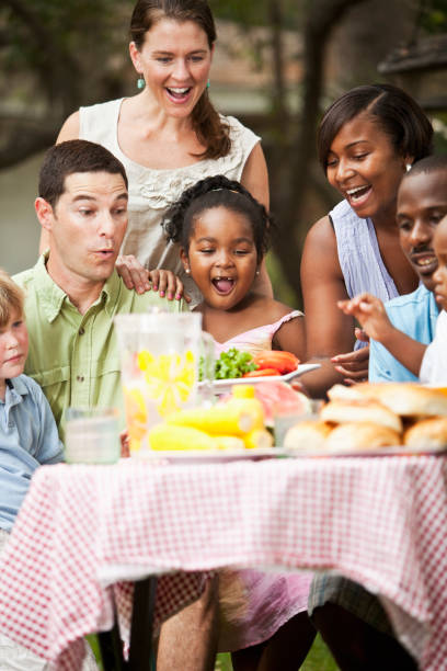 istock Two families at backyard cookout 158210921