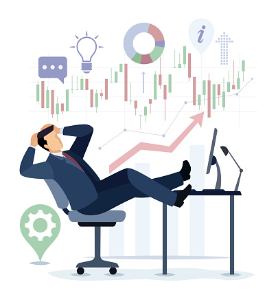 Relaxing Businessman in chair and legs on desk.