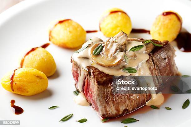 Fillet Of Beef With Mushroom Sauce And Potatoes Stock Photo - Download Image Now - Meat, Sauce, Plate