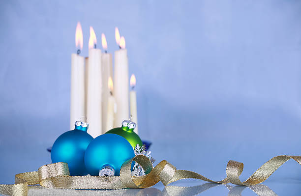 istock Christmas decoration and candles on soft blue cloth 158213879