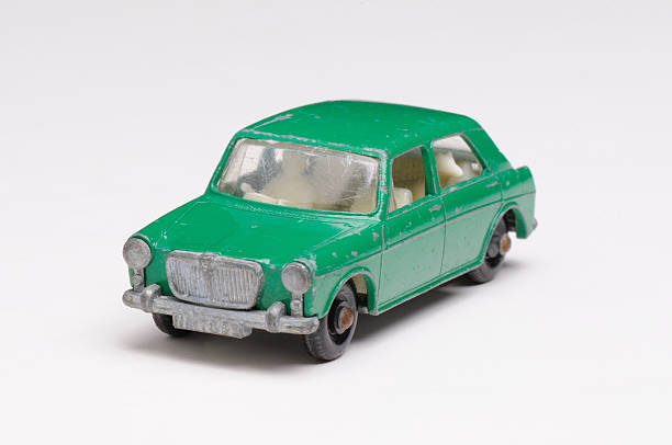 istock toy car dog back seat left hand drive macro close-up 158213936