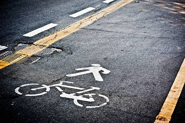 Road with Pedestrian and Bicycle Signal Printed on the Ground stock photo