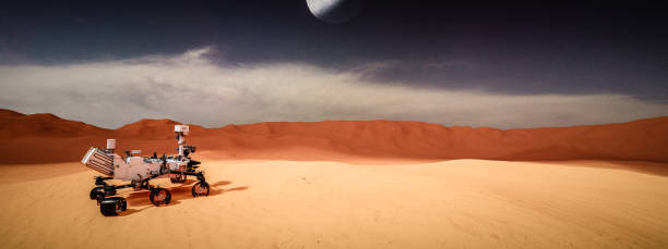 istock Mars rover exploring surface of Mars. Image of automated robotic space autonomous vehicle on the red Mars planet. Space exploration, astronomy science concept. 3D render 1582169405
