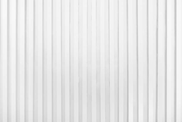 istock white metal siding fence striped background 1582208664