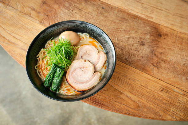 istock Appetizing traditional Japanese soup with noodles served on table 1582212412