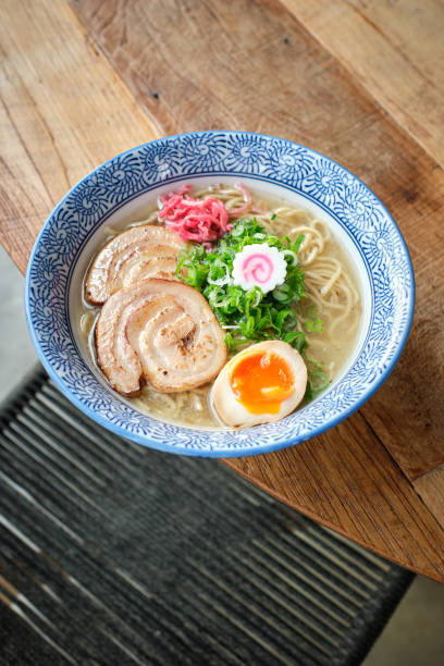 istock Appetizing ramen soup served with narutomaki 1582213457