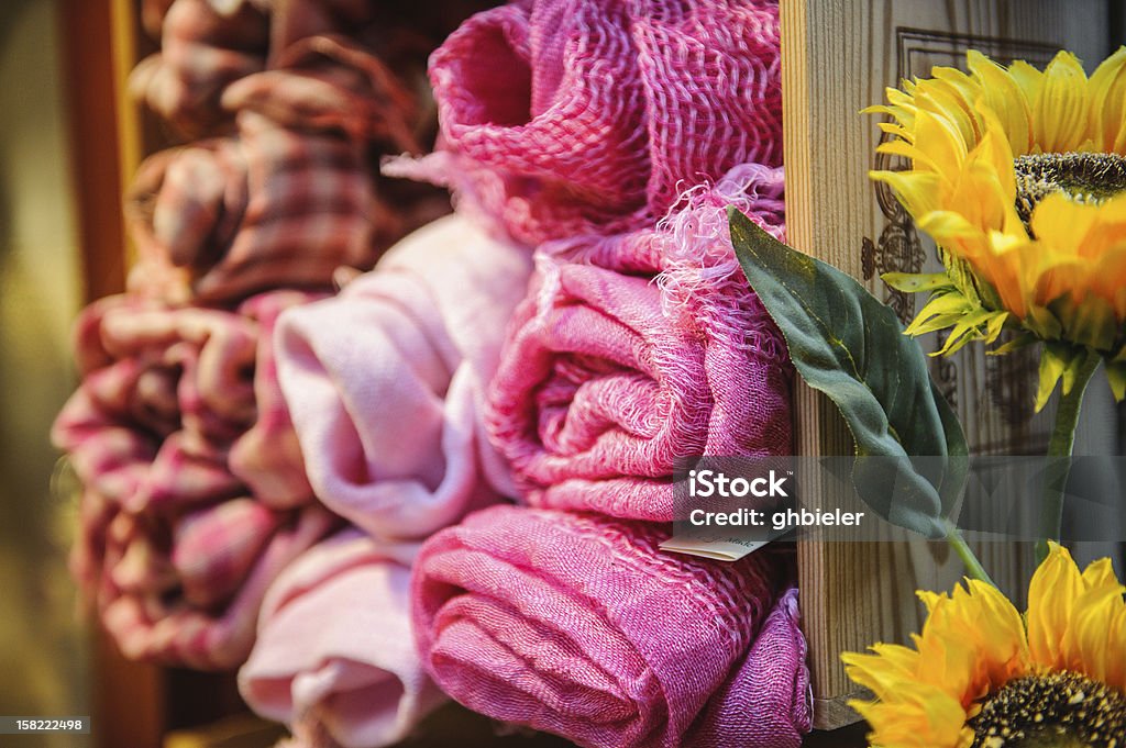 Fabric and Sunflower in Tuscany, Italy Pink textured fabric and sunflower in Tuscany, Italy Horizontal Stock Photo