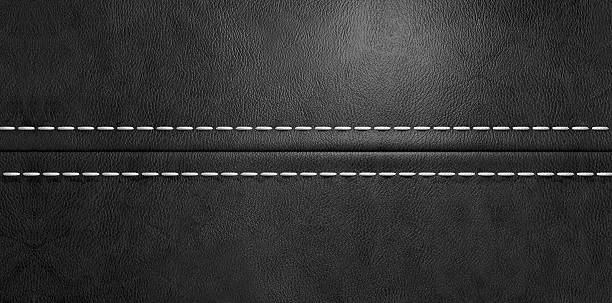 Black Leather Stitched Seam A fabricated stitched seam joining two pieces of black leather together sewing stock pictures, royalty-free photos & images
