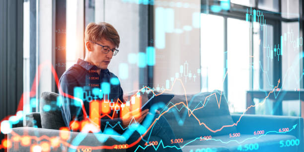 istock Businessman working in tablet, forex analysis and candlesticks d 1582267589