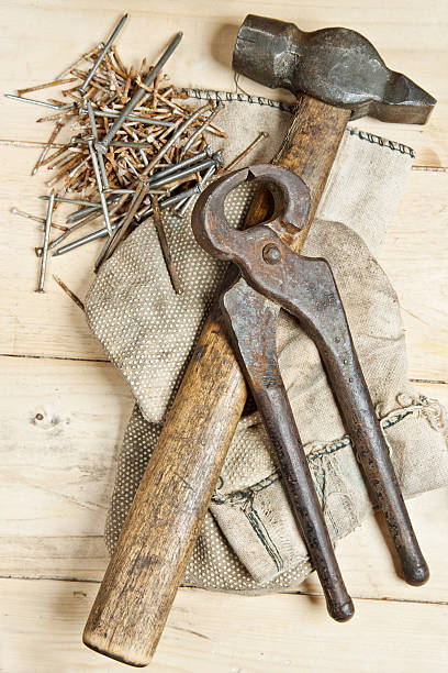 istock Vintage hammer with nails on wood background 158227521