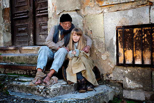 Homeless family is begging on the street  https://lh6.googleusercontent.com/-eaeOMydq7HE/UMWZPr7iDTI/AAAAAAAAAfI/nrlwl_rTL-k/s381/Homeless_lightbox%2520copy.JPG 