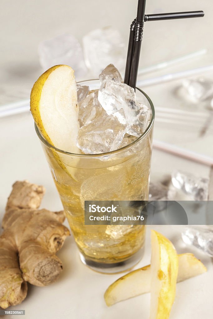 Yellow drink with pears, ginger and ice Alcohol - Drink Stock Photo