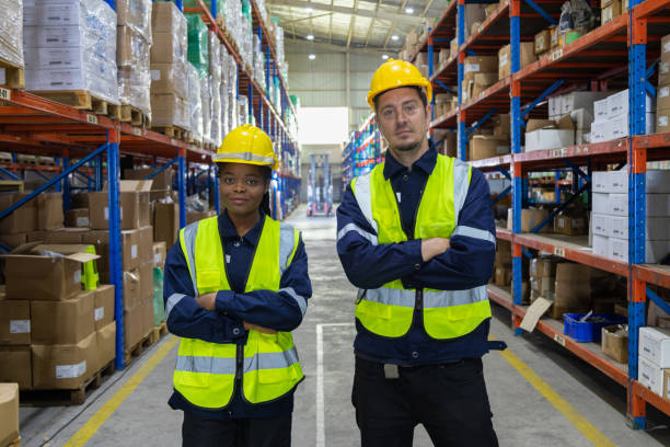 istock Store clerks inspect products, warehouses, industrial and logistics supply chains. 1582328131