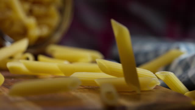 Pasta Penne Falling Down Slow Motion Video