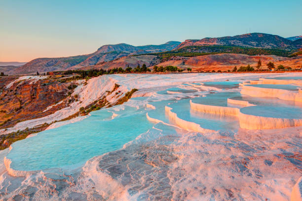 natural travertine pools and terraces in pamukkale. cotton castle in southwestern turkey - mineral waterfall water flowing imagens e fotografias de stock