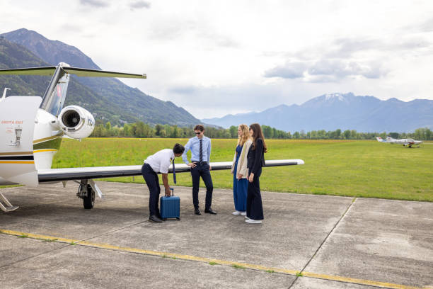 istock Business people meeting pilots before private jet flight 1582350131