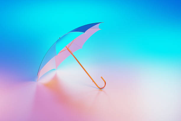 青とピンクの背景に青とピンクのライトで照らされた光沢のある傘