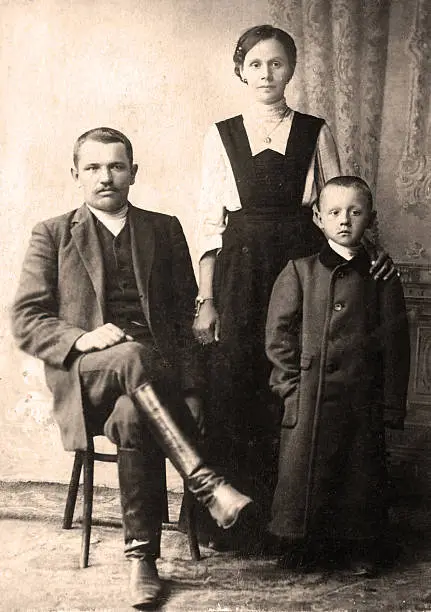 Antique family photo of long ago passed away relatives - circa 1912, Russia.