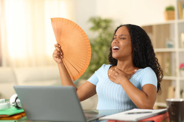 istock Stressed black student suffering heat stroke at home 1582371994