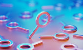 Metallic Magnifier Symbols Illuminated By Blue And Pink Lights On Blue And Pink Background