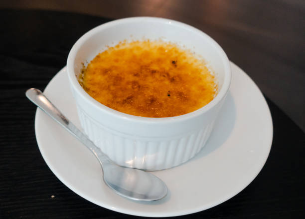 istock Delicious and freshly made creme brulee. 1582389935