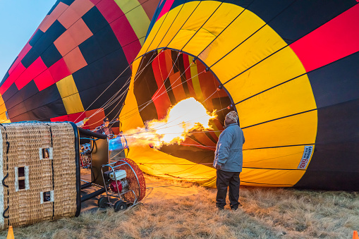 Air Ventures balloon safaris in Johannesburg at cradlemoon nature reserve with balloon being filled with hot air ready for guests arriving for the ride. July 29, 2023.