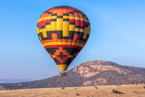 Hot Air Balloon getting ready for liftoff at dawn in the Sonoran Desert near Phoenix Arizona