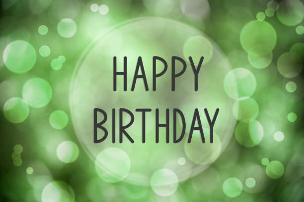 Green Shiny And Sparkling Blurry Christmas Background With Text Happy Birthday